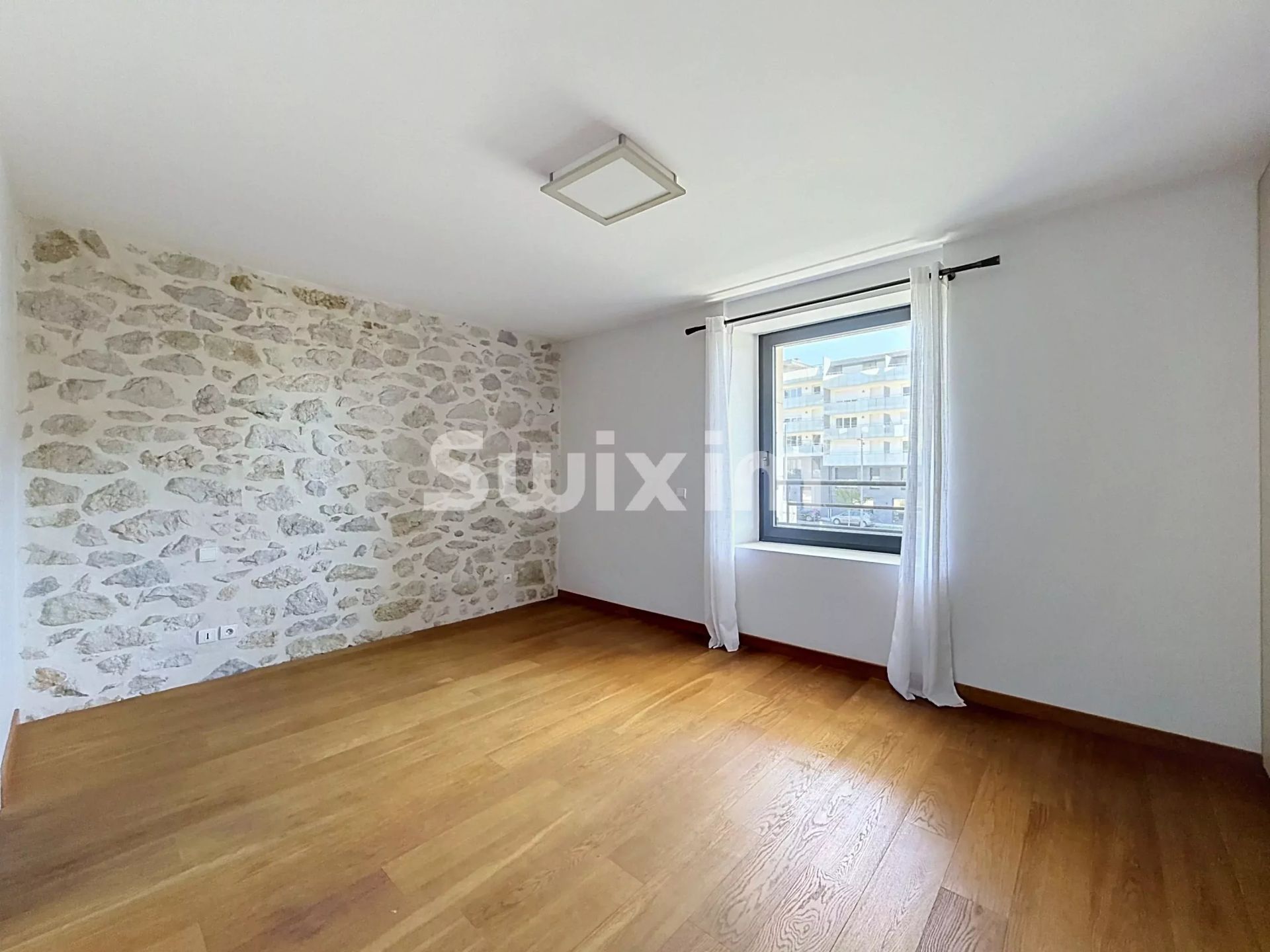 appartement 4 Pièces en vente sur Saint-Genis-Pouilly (01630)